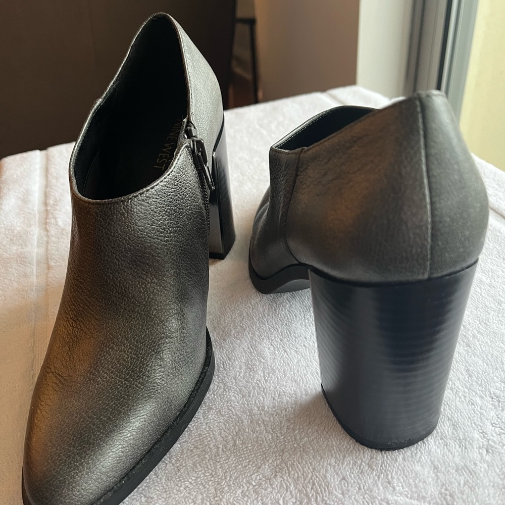 Nine West Booties. Grey w/black stacked heel. Size 8.5 medium. New condition.
